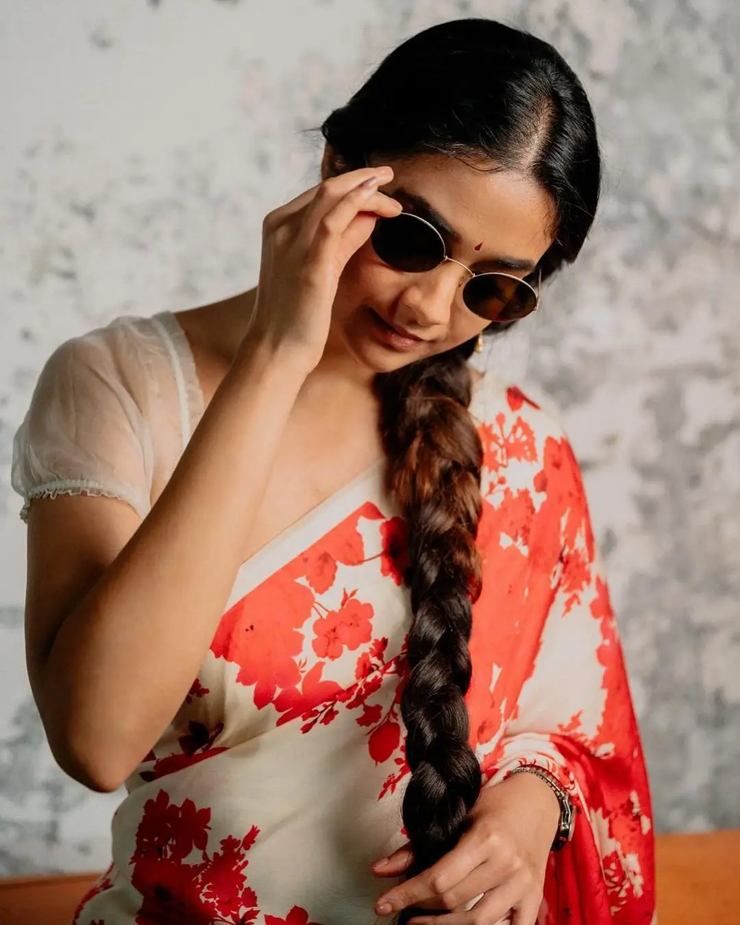 Keerthy Suresh Stills in Orange Saree Sleeveless White Blouse